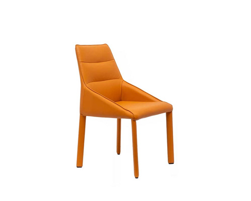 Mazara modern dining chair in a vibrant orange finish, perfect for adding a splash of color to your dining space. Now available at MH2G Furniture Showrooms.