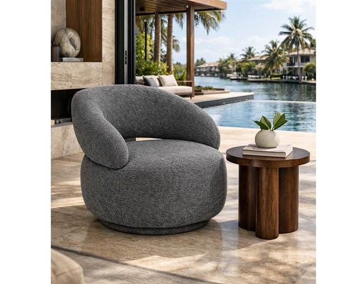 Modern lounge chair with a sculptural frame and deep, comfortable seat