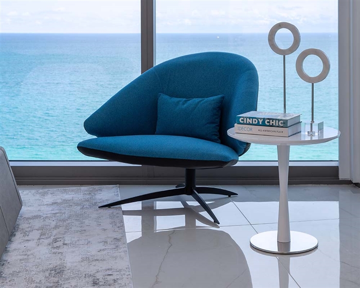 Modern side table positioned beside a sofa in a contemporary living room